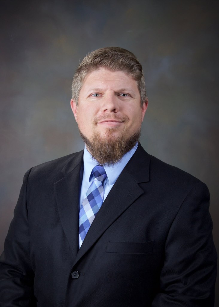 Adam Coker