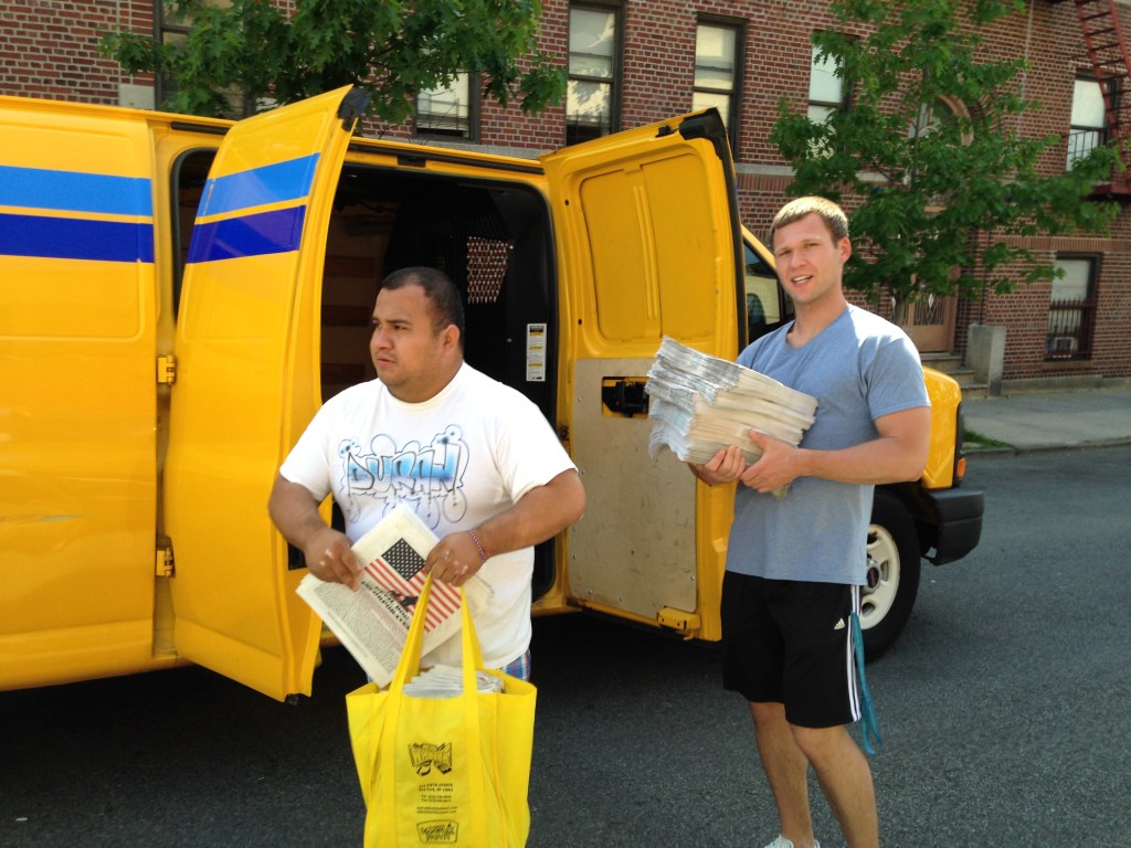 Gonzalo and Yegor Giving Out Newsletter